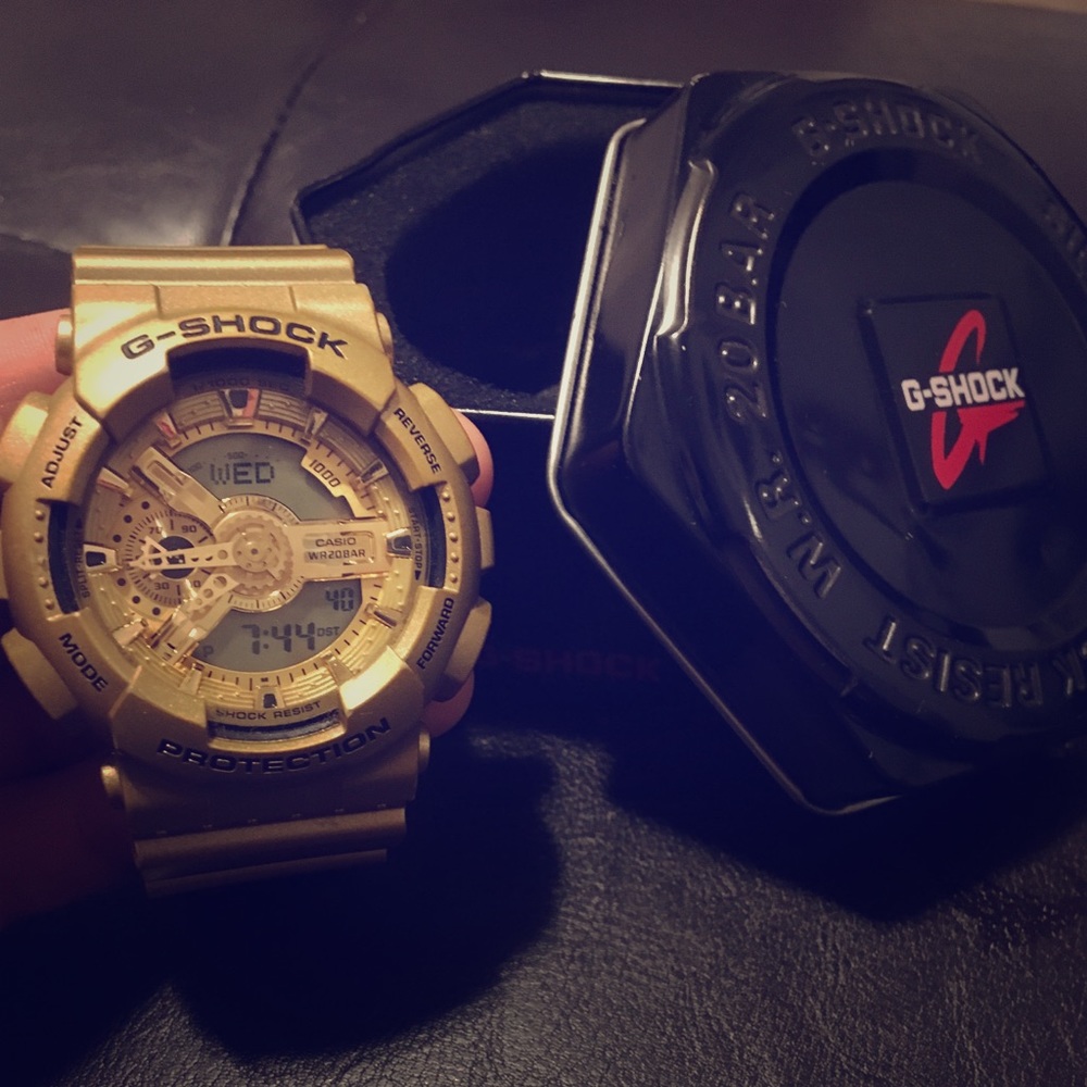 Gold Casio G-Shock watch.